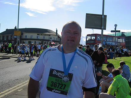 Neil at The Great North Run finish line looking hot and sweaty!